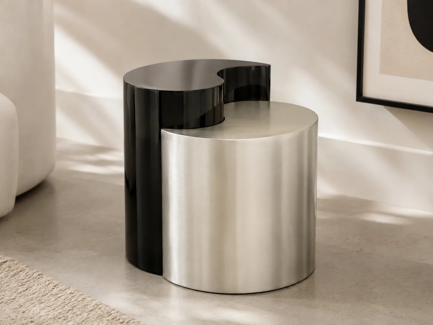 Sculptural black and silver chrome side table